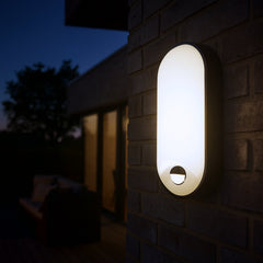 Plafón LED exterior ovalado con sensor PIR - 15W - CCT - IP65