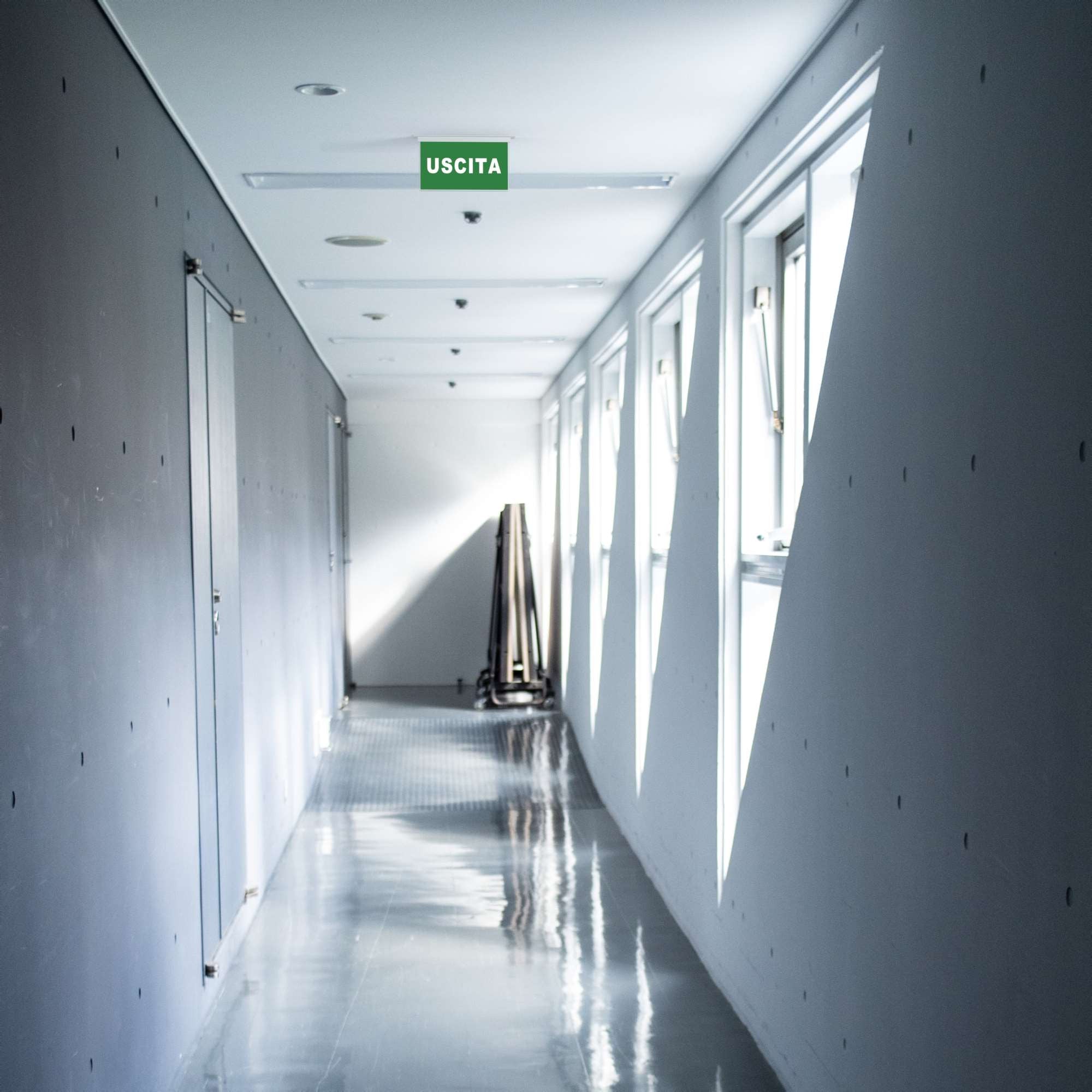 Luz de emergencia permanente con cartel autoadhesivo "Salida" - Empotrable